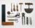 An arrangement of tools including pliers, dowls, scissors, knives and other implements
